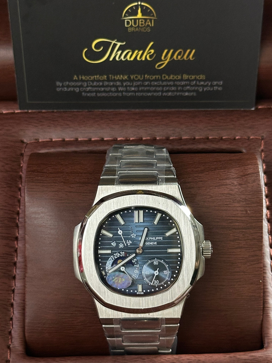 Patek Philippe Nautilus Moonphase  Manual Wind  Blue Dial