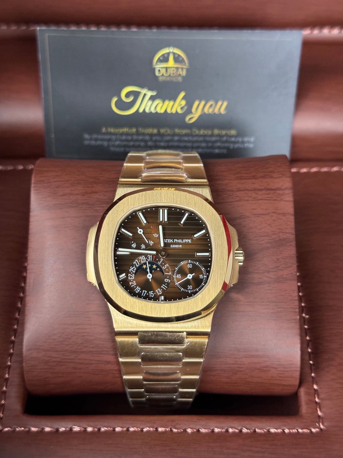 Patek Philippe Nautilus Moon Phase Rose Gold Brown Black Dial