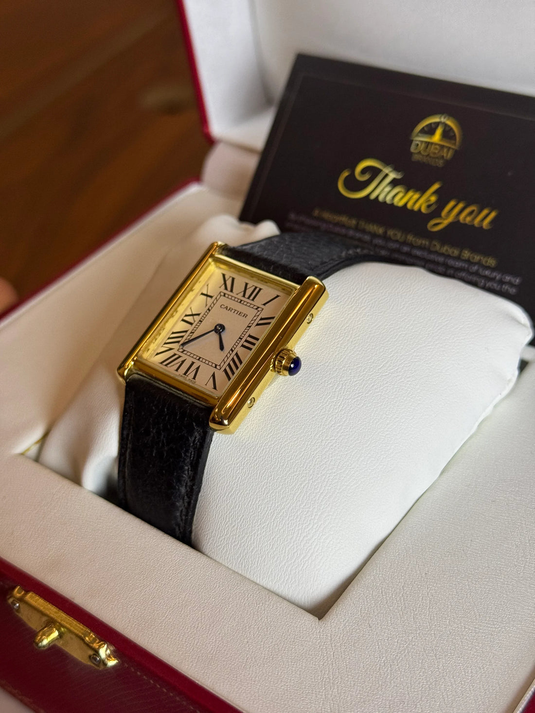Cartier Tank Solo Medium Yellow Gold White Dial Roman Numerals Black Leather Strap