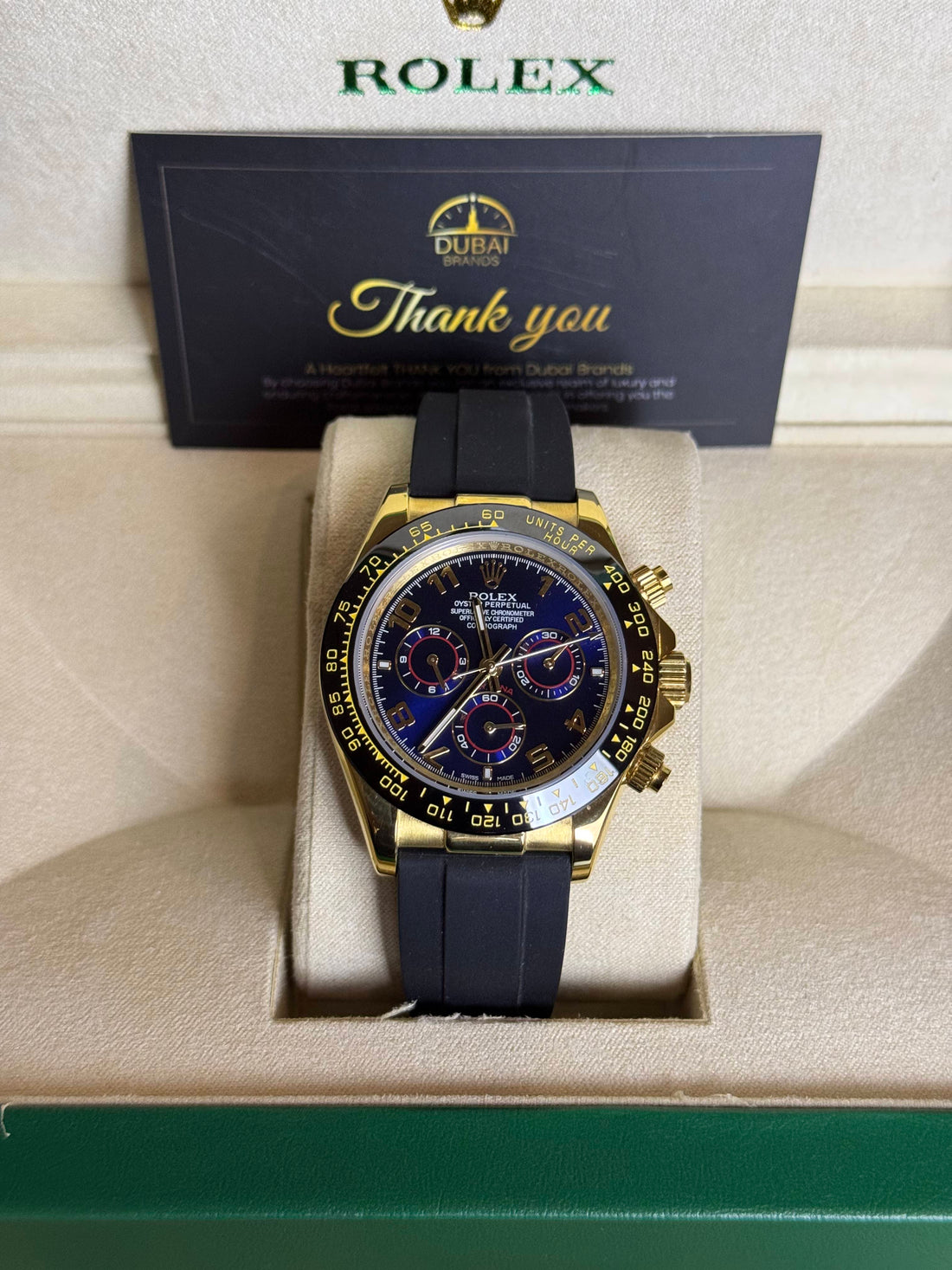 Rolex Daytona 40 Yellow Gold Blue Dial Red Subdials Ceramic Rubber