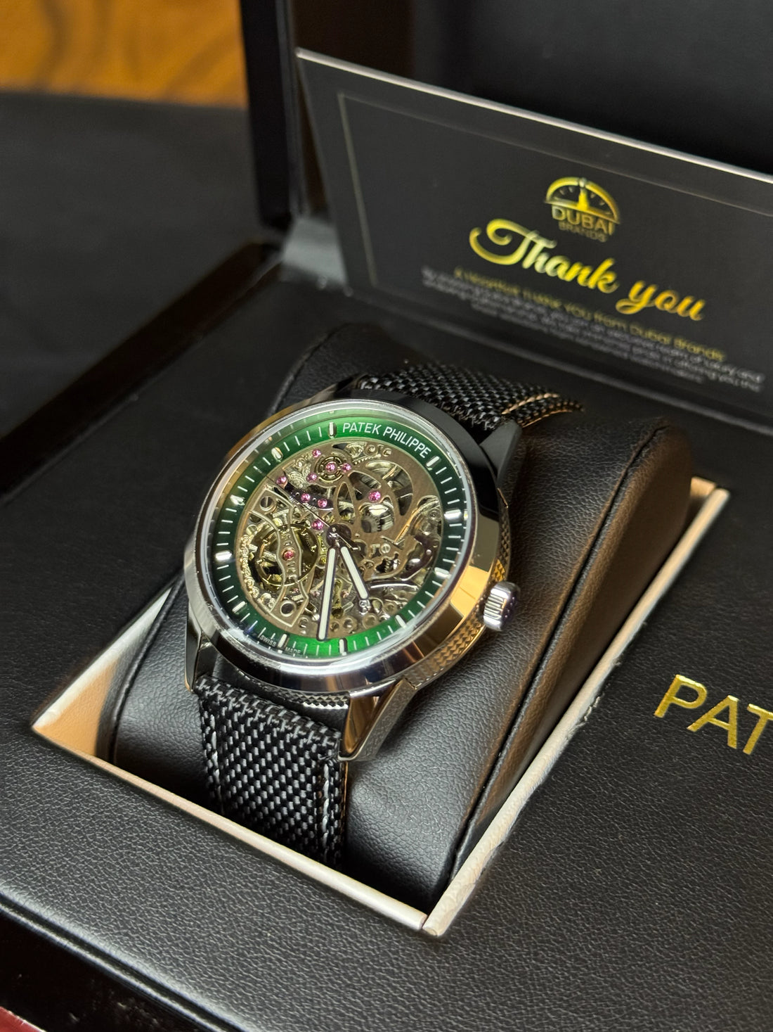 Patek Philippe Style Skeleton Dial Green Chapter Ring Black Case Black Mesh Strap