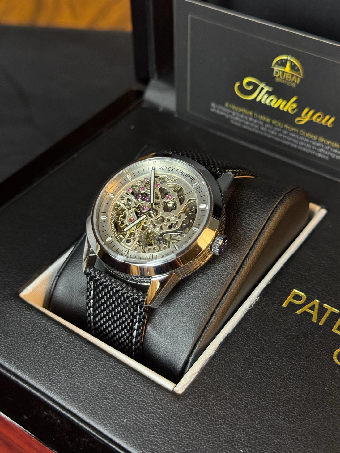 Patek Philippe Style Skeleton Dial Silver Chapter Ring Black Case Black Mesh Strap