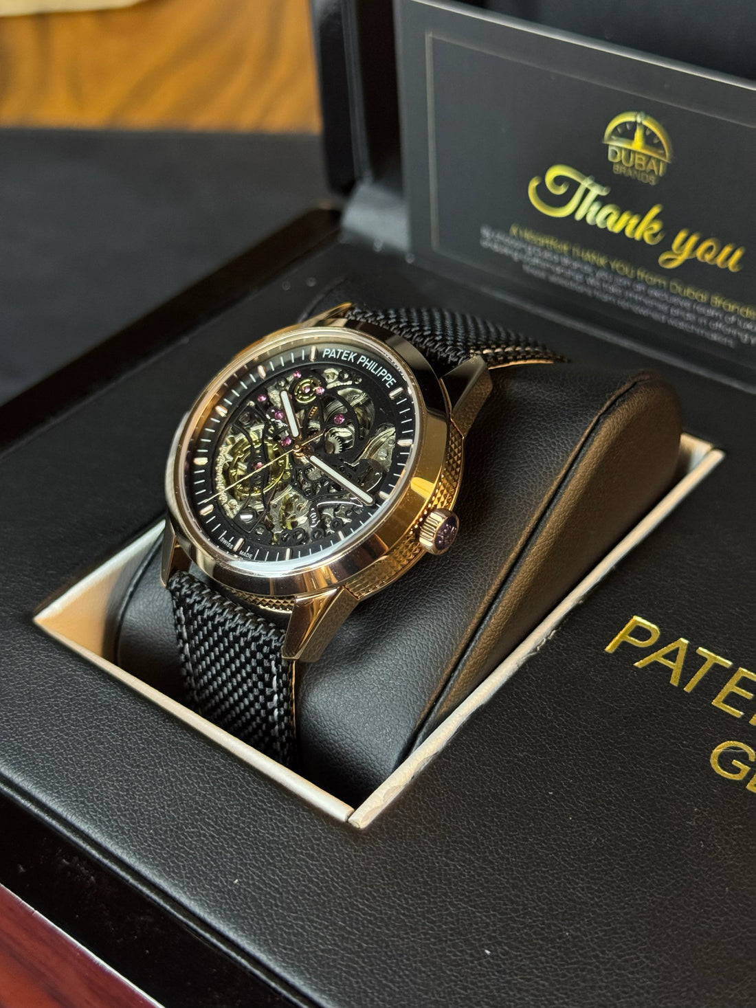 Patek Philippe Style Skeleton Dial Black Chapter Ring Rose Gold Case Black Mesh Strap