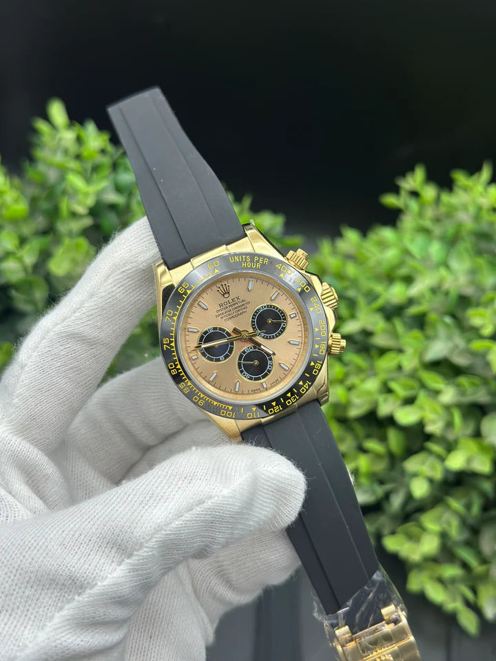 OYSTER FLEX DEYTONA COSMOGRAPH gold dial black chronograph