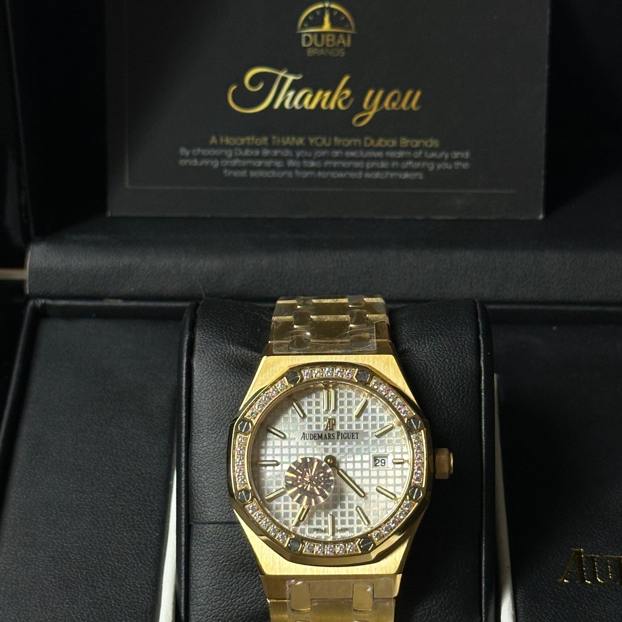 Audemars Piguet Royal Oak – Gold Tone with Diamond Bezel & White Tapisserie Dial